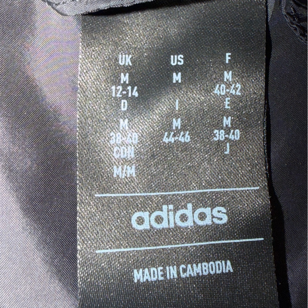 NWOT Adidas Black and White Track Jacket sz M in women’s. Has large pockets. - Picture 9 of 11